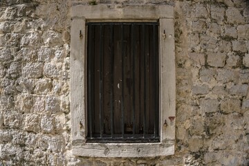 Closeup view of a window on brick wall building