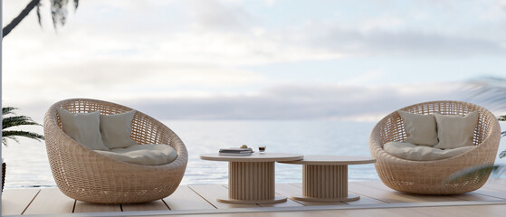 Round wicker beach chairs and minimal wooden coffee table on patio by the pool with sky view