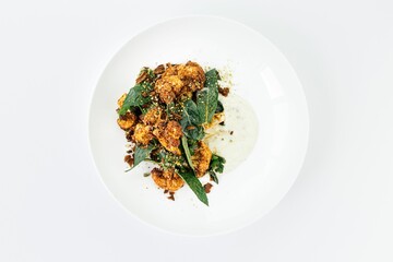 Fried Cauliflower served with greens