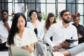 Obraz premium conducts business training with a group of young people.
