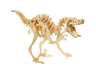 Wooden toy dinosaur skeleton isolated on white background, Wooden dinosaur crafts.