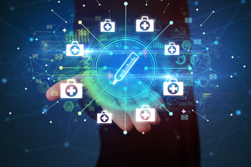 Hand holding healthcare icons concept