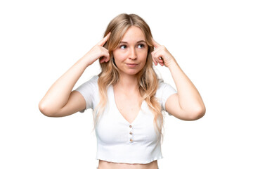 Young English woman over isolated background having doubts and thinking