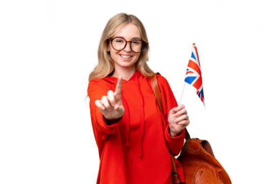 Young hispanic woman holding an United Kingdom flag over isolated background showing and lifting a finger