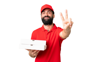 Pizza delivery man with work uniform picking up pizza boxes over isolated chroma key background smiling and showing victory sign