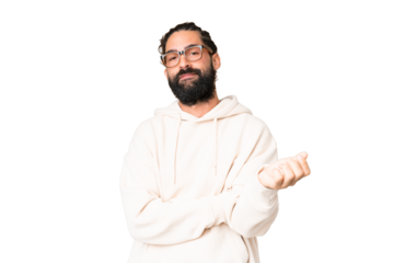 Young man with beard over isolated chroma key background having doubts