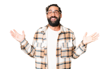 Young man with beard over isolated chroma key background with shocked facial expression