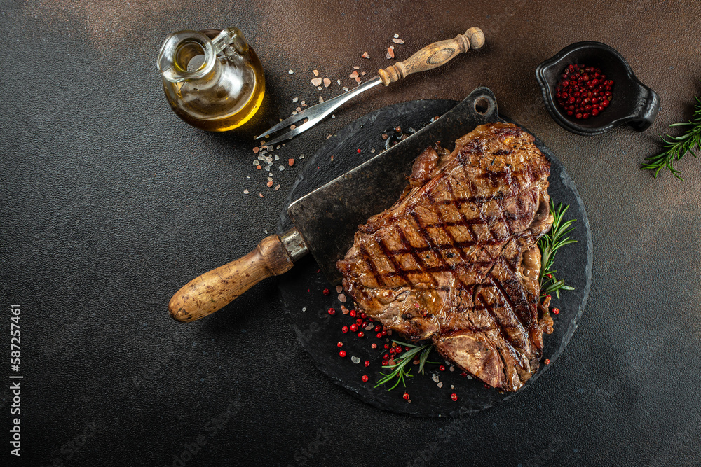 Wall mural t-bone or porterhouse beef meat steak for steakhouse menu. banner, menu, recipe place for text