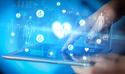 Close-up of a touchscreen with healthcare icons
