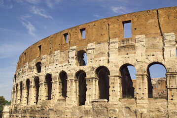 Obraz premium fragment of colosseum walls in dark blue sky