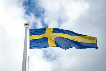National flag of Sweden waving in the wind.