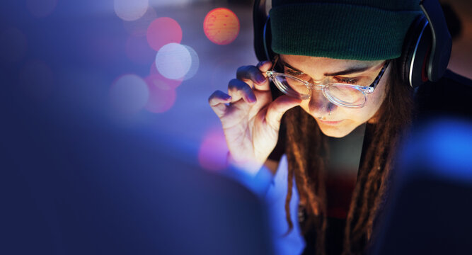 Cyber security, woman or hacker working on computer in the basement at night for phishing on database. Bokeh mockup, focus or girl coder hacking ai digital network password on internet or website