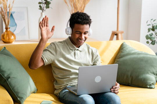 Smiling black man listening to music