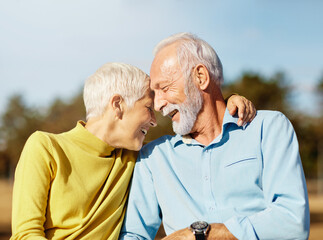 woman man outdoor senior couple happy lifestyle retirement together smiling love fun elderly active...