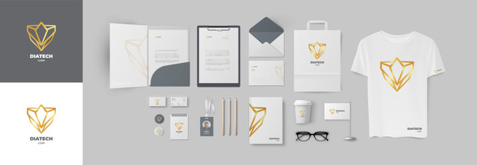 Golden diadem logo and grey premium corporate style set. Stationery branding design with geometric sign and light color gamma. Folder and business card, envelope and A4 form, paper bad and notepad pen