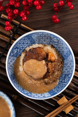 Migao, tube rice cake, rice pudding in a bowl, delicious Taiwanese street food.