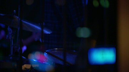 Close-Up Slow Motion Shot Of Musicians Performing With Drum Kit At Restaurant - Los Angeles, California