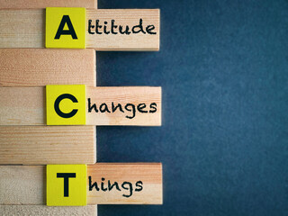 Attitude changes things text background. Inspirational and motivational concept. Stock photo.