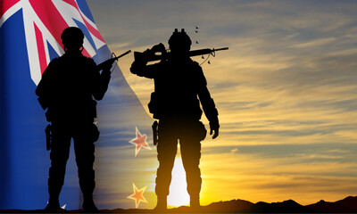 Silhouettes of a soldiers with New Zealand flag against the sunset. Background fo memorial day. EPS10 vector