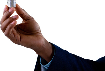 Fototapeta premium Close up of hand of businessman holding a bulb screw base against white background