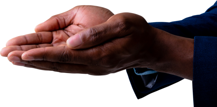 Close up view of businessman holding an invisible object against white background