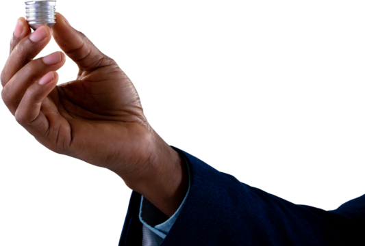 Close up of hand of businessman holding a bulb screw base against white background