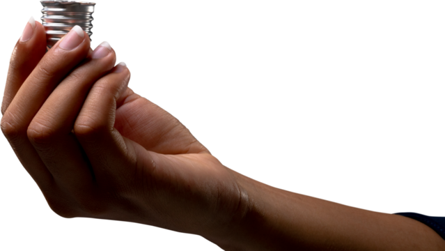 Close up of hand of businesswoman holding a bulb screw base against white background - Powered by Adobe