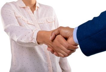 Mid section of businessman and businesswoman shaking hands against white background