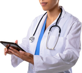 Mid section of african american female doctor using digital tablet against white background