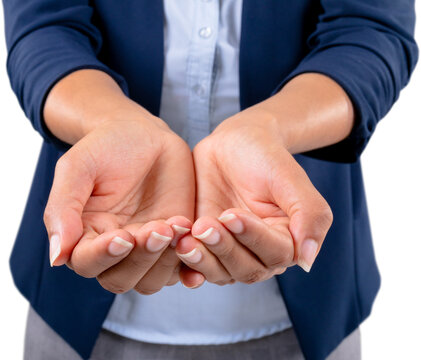Mid section of businesswoman holding an invisible object against white background