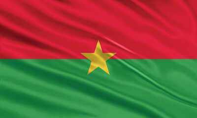 Burkina Faso flag design. Waving Burkina Faso flag made of satin or silk fabric. Vector Illustration.