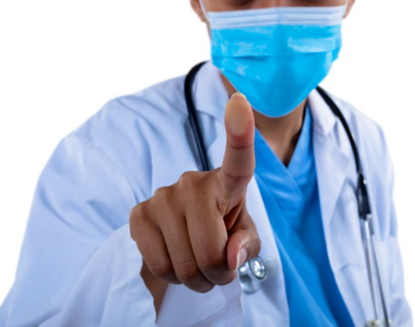 Mid section of female doctor wearing face mask touching an invisible screen against white background
