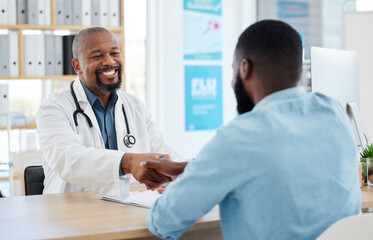 Fototapeta na wymiar Happy doctor, patient and handshake in healthcare for checkup, consultation or agreement at hospital. Black man, medical professional shaking hands with client for consulting, visit or appointment