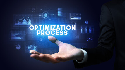 Hand of Businessman holding motivational message