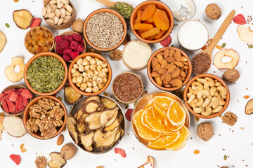 Organic Healthy Assorted Dried Fruit Mix close up. Dried fruit snacks. dried apples, mango, feijoa, dried apricots, prunes top view