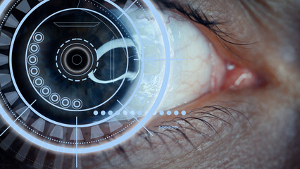 Close-up of a male eye with visual effects. The concept of a sensor implanted in the human eye....