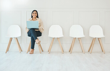 Portrait, laptop and woman in waiting room, interview or recruitment, hiring or office job....