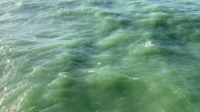 Green raging waves of the cold sea. High quality FullHD footage
