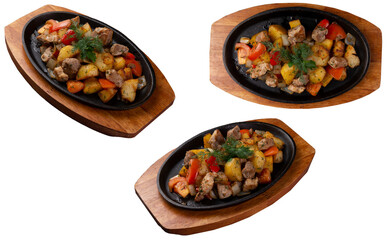 Fried potatoes with meat and vegetables in a frying pan. Transparent.