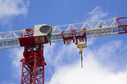 Construction crane close up. Concept: real estate agency, investment.