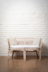 Rattan Living Room Loveseat on white brick wall background