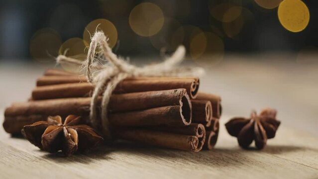 Close up view of romatic spices on wooden table