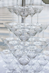 a pyramid of glasses for the party