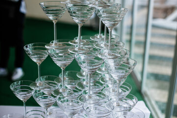 a pyramid of glasses for the party