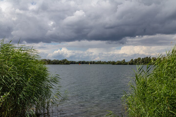 Lake with dramatic sky in summer