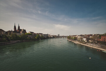 Fototapeta na wymiar Beautiful architecture of Basel, Switzerland, at the River Rhine on a sunny day