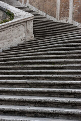 Antique stone staircase in Rome Italy. Selective focus
