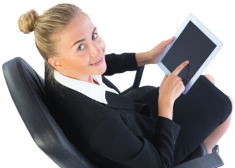 Businesswoman sitting on swivel chair with tablet