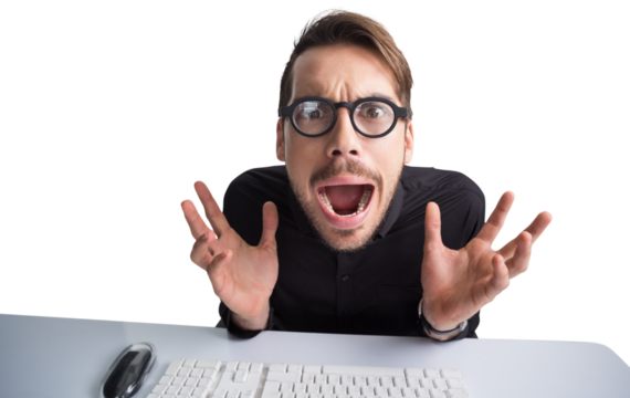 Worried businessman with glasses using computer  - Powered by Adobe