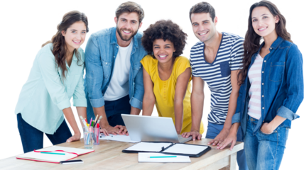 Group of young colleagues using laptop 